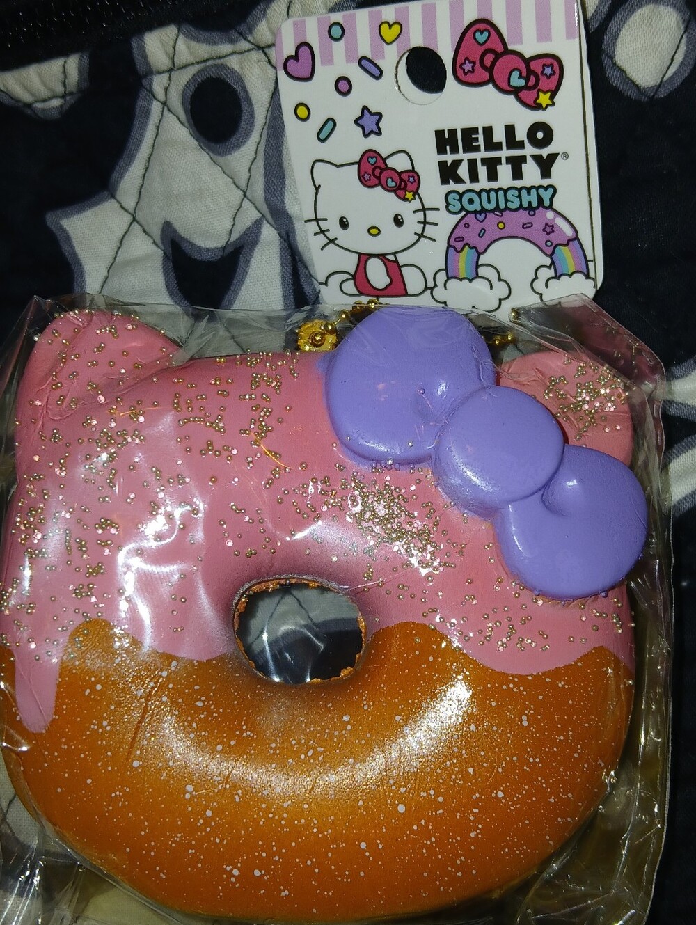 Hello Kitty Pink Frosting Donut Squishy Keychain with Purple Bow